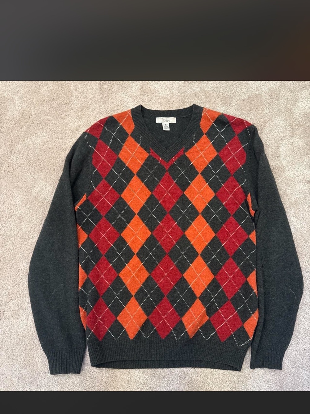 Men's Turnbury V-Neck Sweater with Orange & Red pattern.